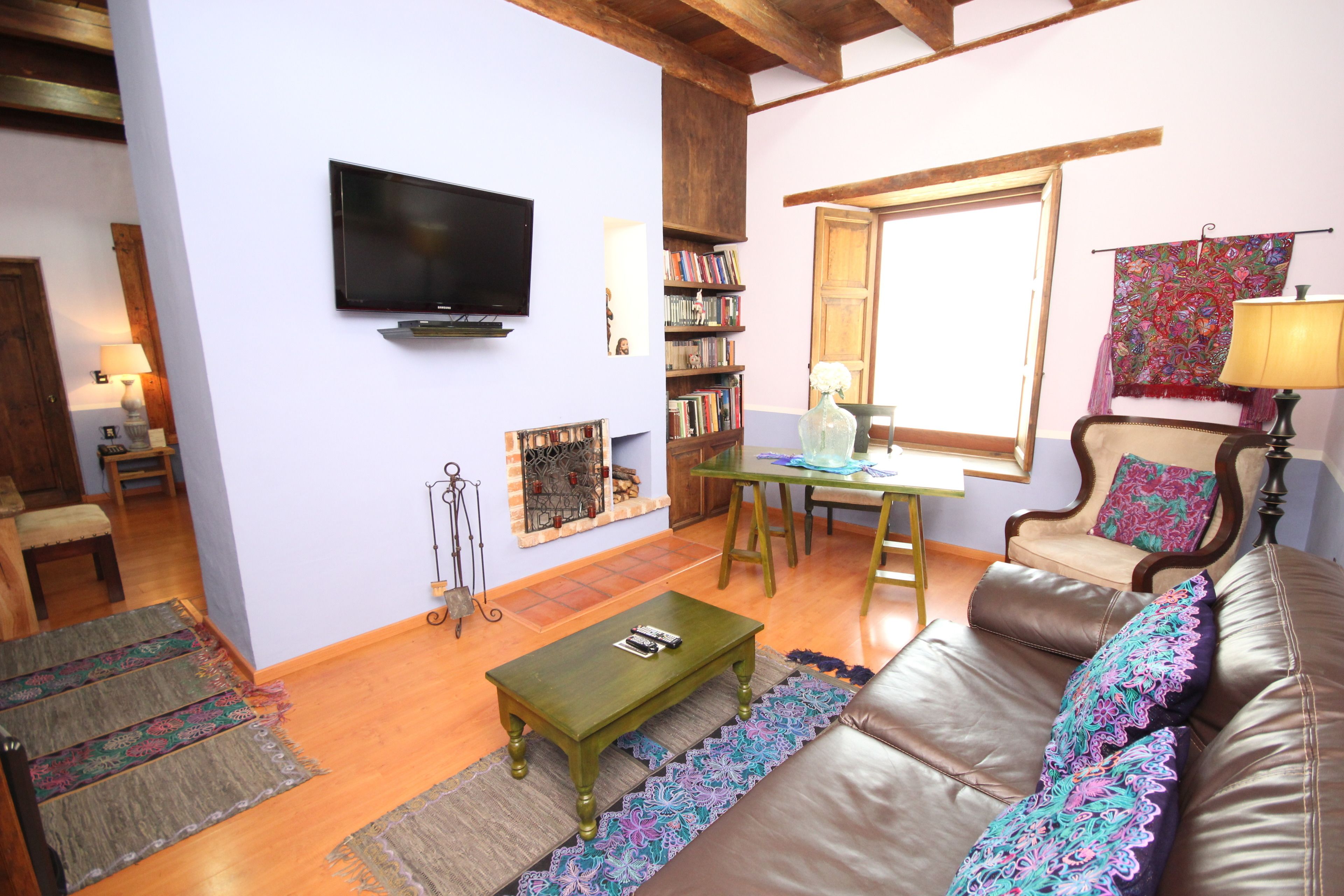 master suite | living area | flat-screen tv, fireplace