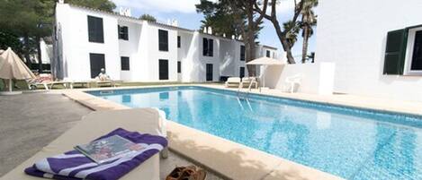 Outdoor pool, pool umbrellas, pool loungers