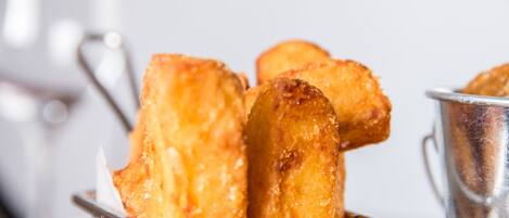 A basket of fried food items.