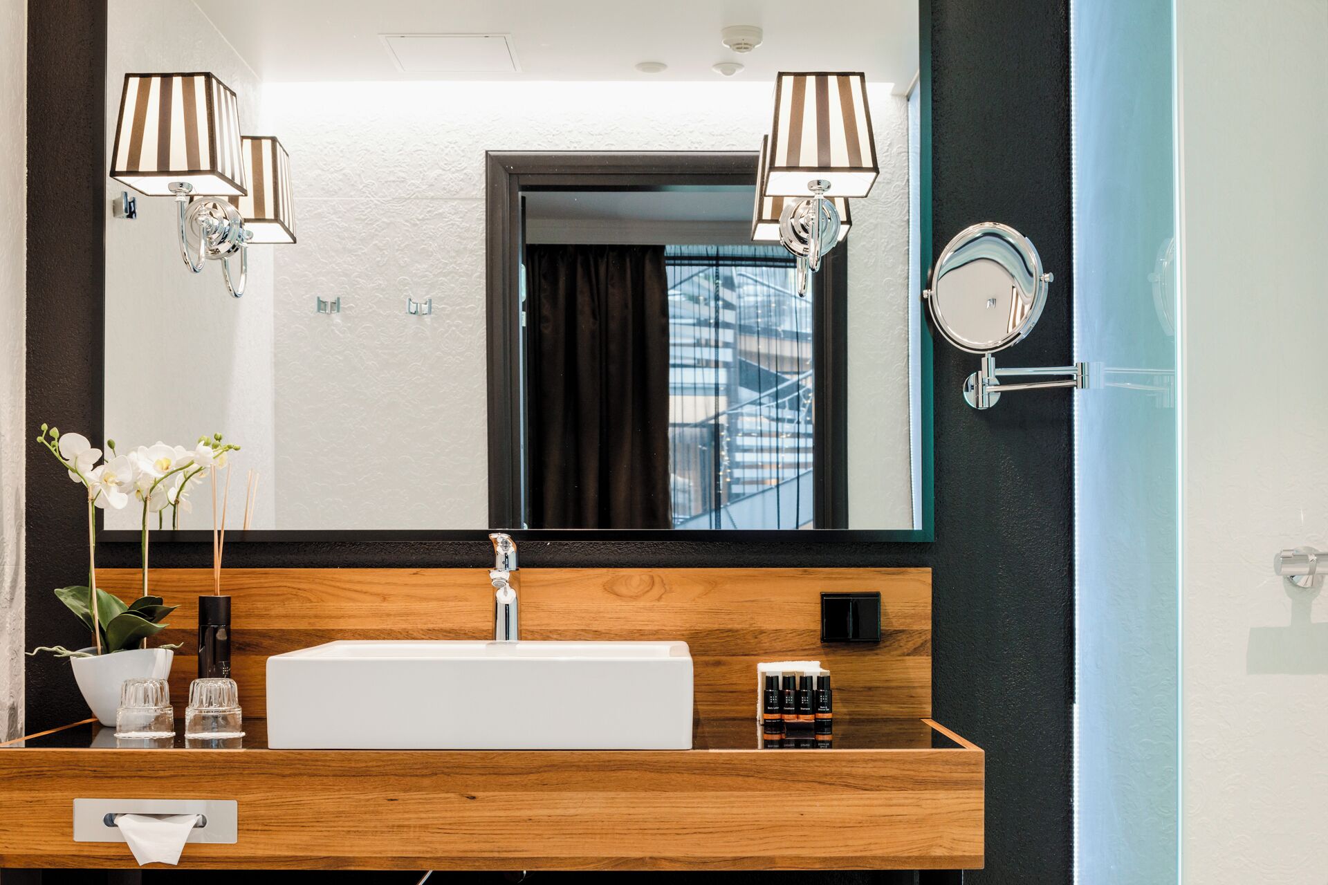 deluxe room | bathroom | designer toiletries, hair dryer, bathrobes, slippers