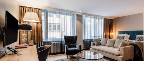 Premium bedding, down comforters, pillowtop beds, minibar