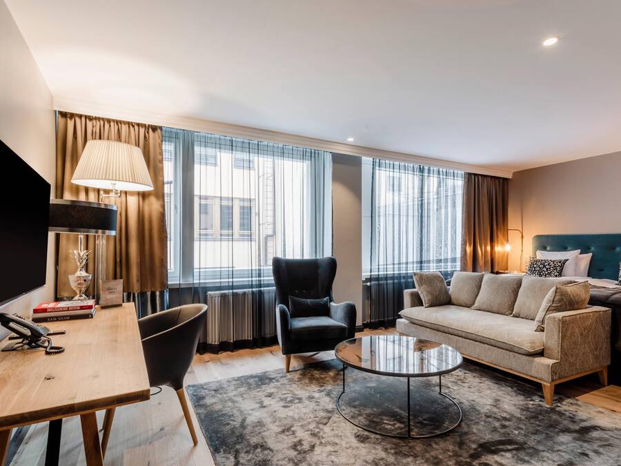 Premium bedding, down comforters, pillowtop beds, minibar