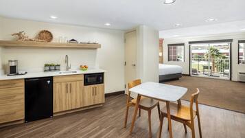 Suite, 1 King Bed, Balcony | Iron/ironing board, bed sheets