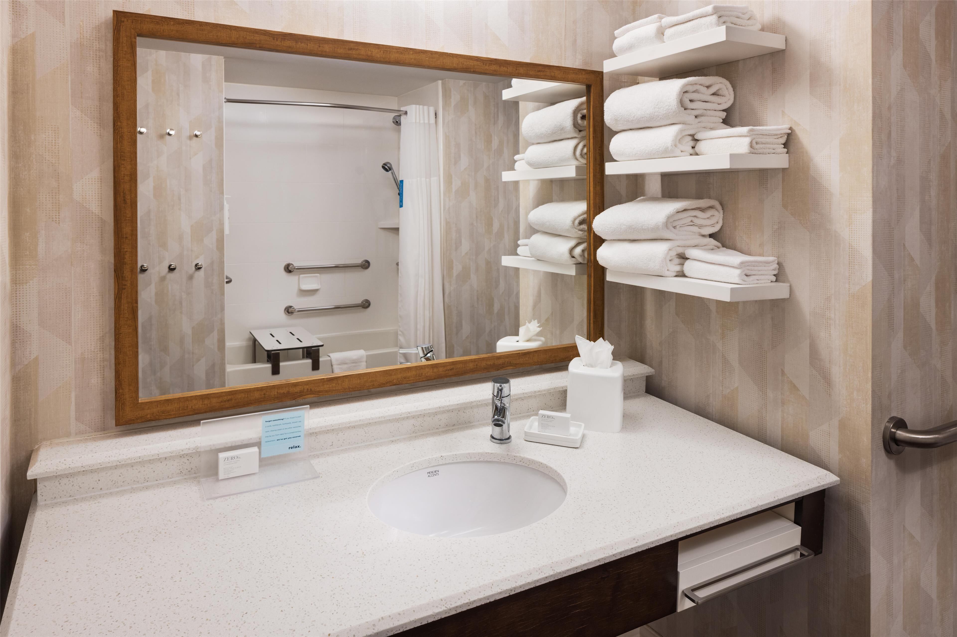 hair dryer, towels, soap, shampoo