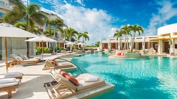 4 outdoor pools, free pool cabanas, pool umbrellas