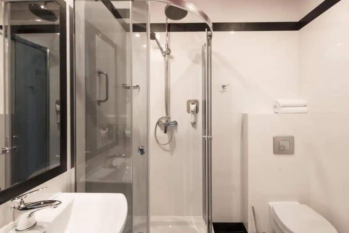 shower, eco-friendly toiletries, hair dryer, towels