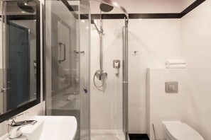 Shower, eco-friendly toiletries, hair dryer, towels