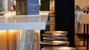 A menu board titled "L'Autographe Brasserie" with a list of items and prices. - ibis Styles La Roche-sur-Yon (Mouilleron-le-Captif)