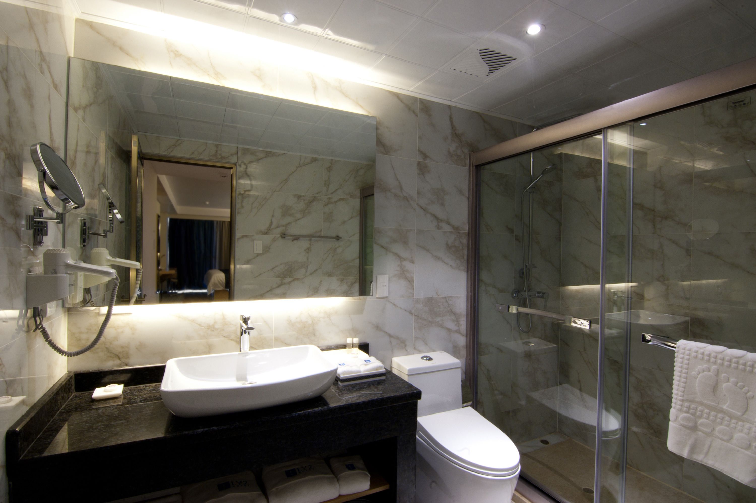 shower, free toiletries, hair dryer, slippers