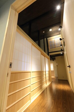 Japanese Villa | Living area | LCD TV, MP3 dock - Kyoto Ikken Machiya Satoi Tetsusen Omiya Gojo (Kyoto)