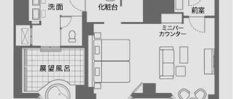 A hotel layout with a bathroom, a washbasin, a toilet, a sink, a shower area, a dining area, a kitchen, and a living room.