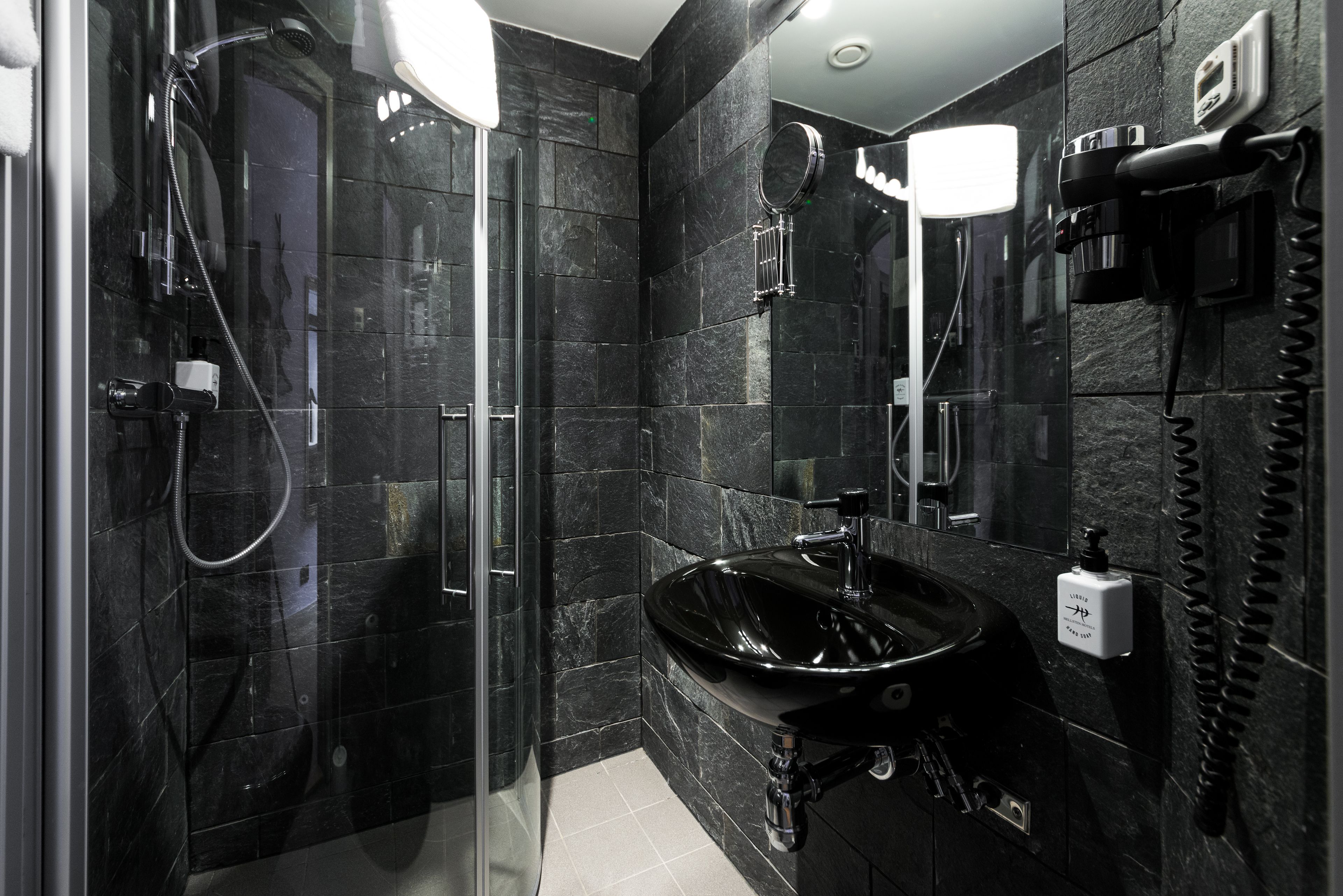 superior double room | bathroom | shower, hair dryer, towels