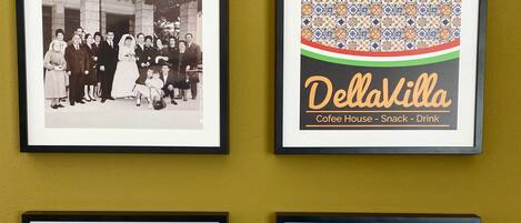 Four framed photographs on a wall.