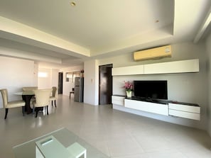 Apartment, 2 Bedrooms | Living area | 32-inch LCD TV with cable channels, TV - I Am Residence (Patong)