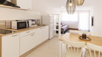 Apartment, 2 Bedrooms | Blackout curtains, iron/ironing board, free cots/infant beds, free WiFi