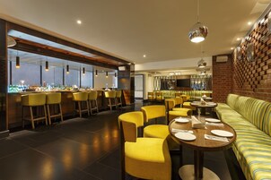 Cocktail bar, al fresco dining, open daily