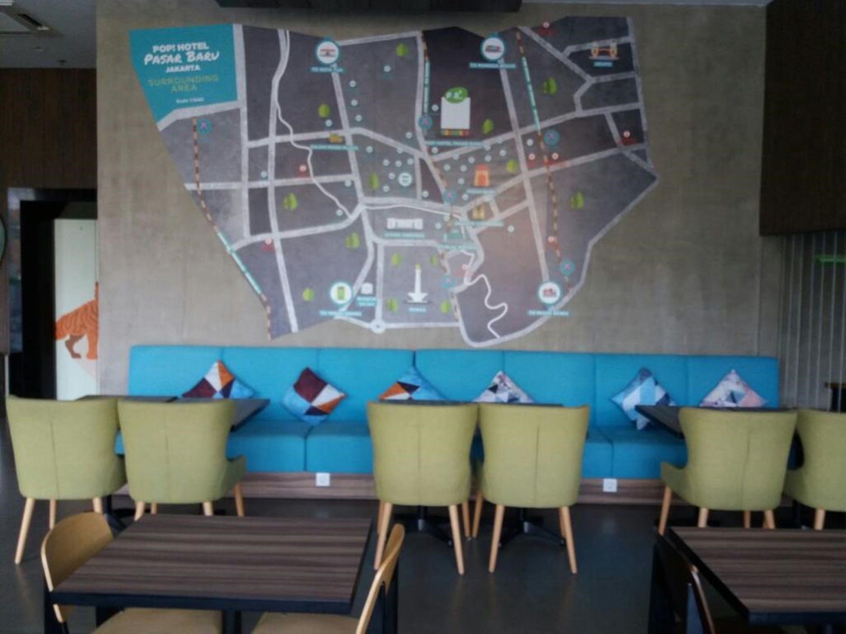 A map of a hotel area with seating arrangements and tables.