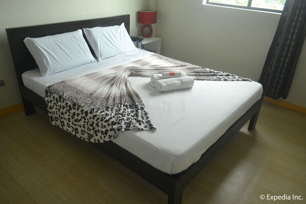 Habitación Deluxe | Caja de seguridad en la habitación, insonorización y camas extra 