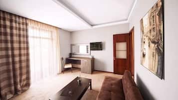 Superior Double or Twin Room | Living area | Plasma TV