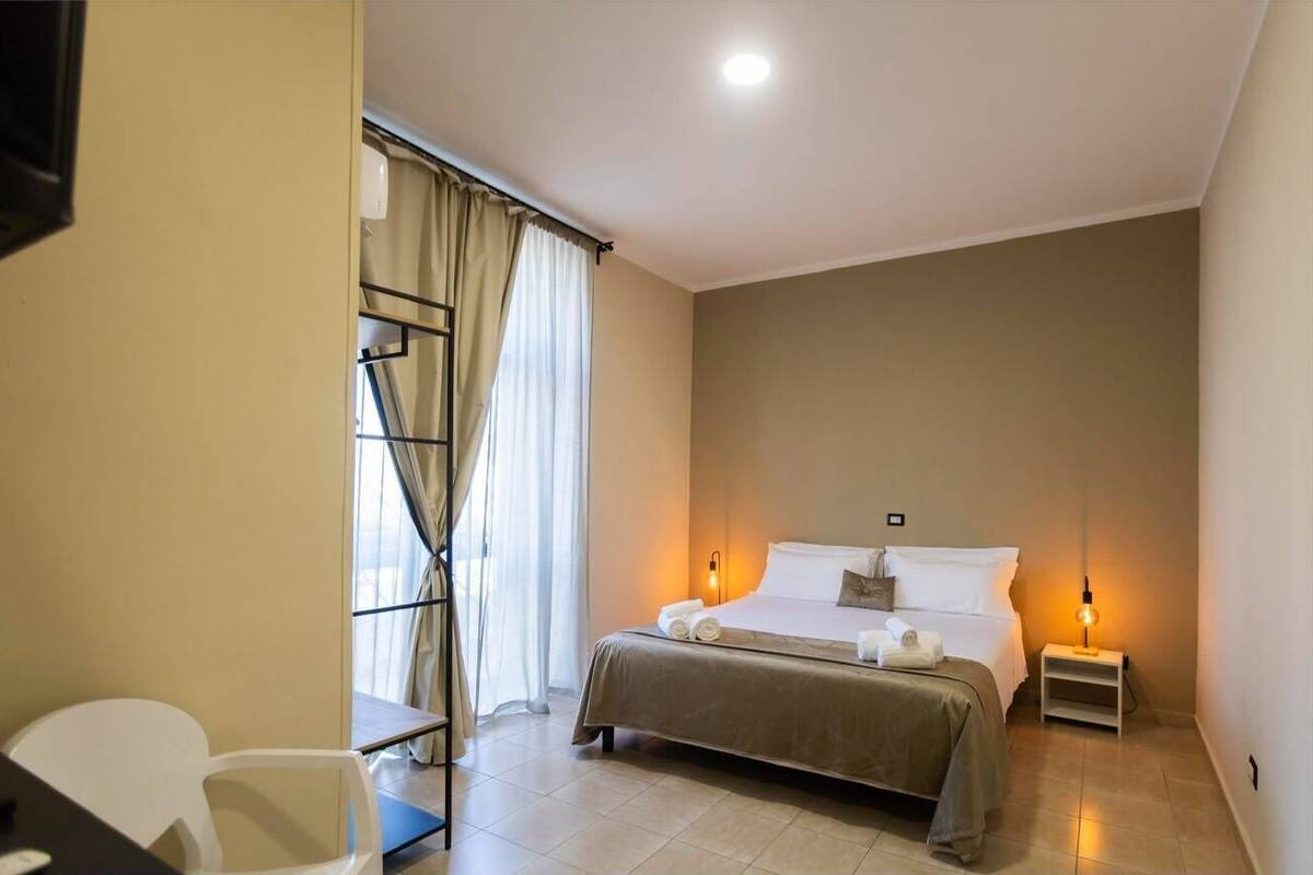 Junior Suite, City View | Desk, blackout curtains, bed sheets