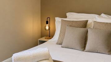 Desk, blackout drapes, bed sheets