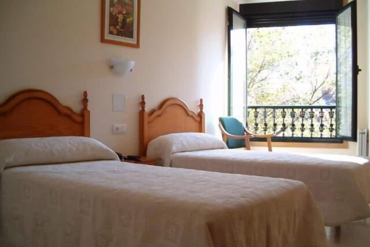 1 bedroom, desk, blackout curtains, iron/ironing board