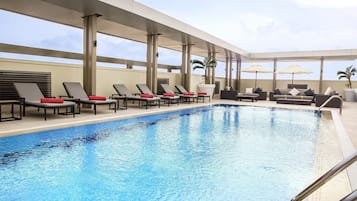 2 outdoor pools, pool umbrellas, lifeguards on site