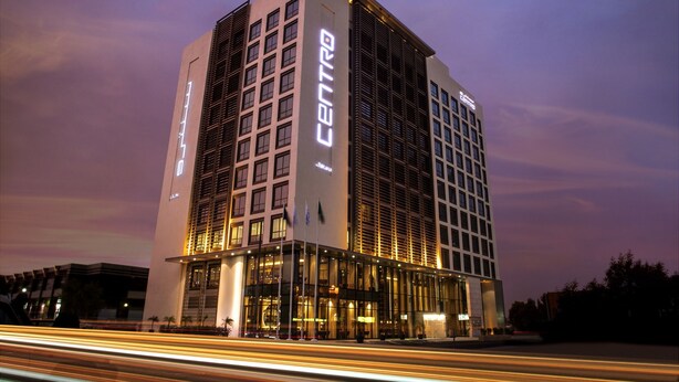 A modern hotel with a prominent 'CENTRE' sign, featuring a glass facade and multiple floors. - Centro Shaheen Jeddah by Rotana (Jeddah)