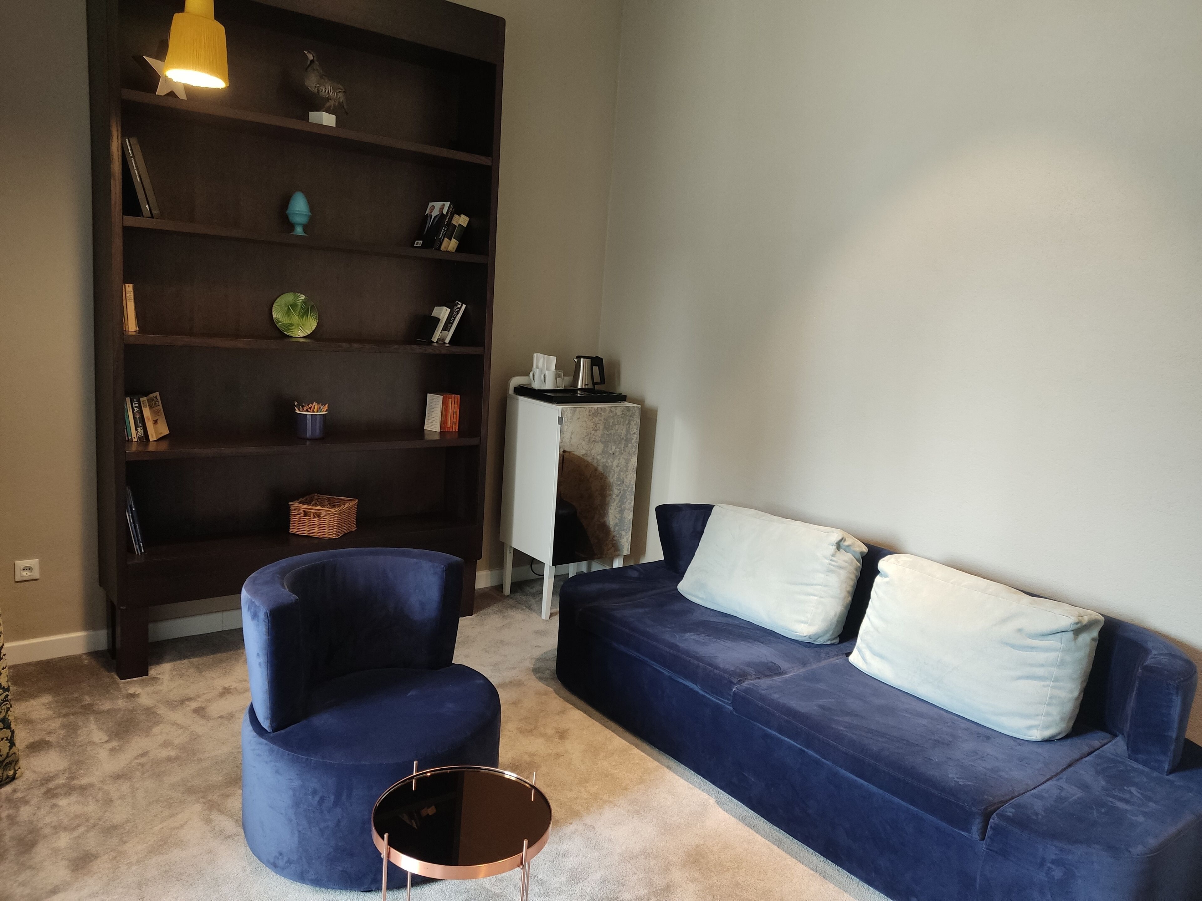 junior suite, sea view | living area | flat-screen tv