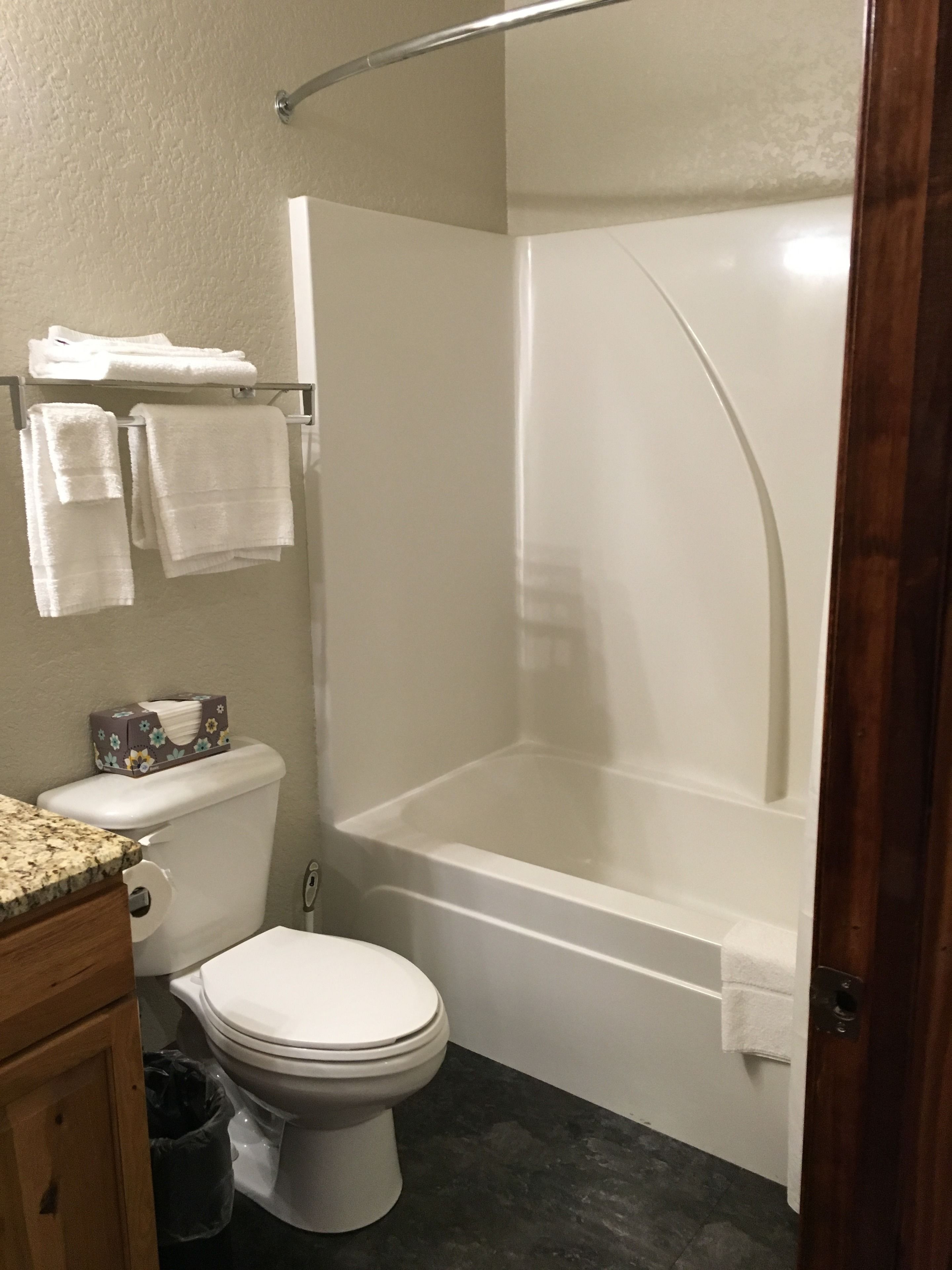 combined shower/bathtub, rainfall showerhead, free toiletries, towels