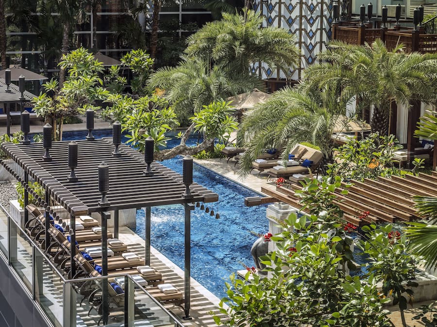 Outdoor pool, open 7:00 AM to 7:00 PM, free cabanas, pool umbrellas