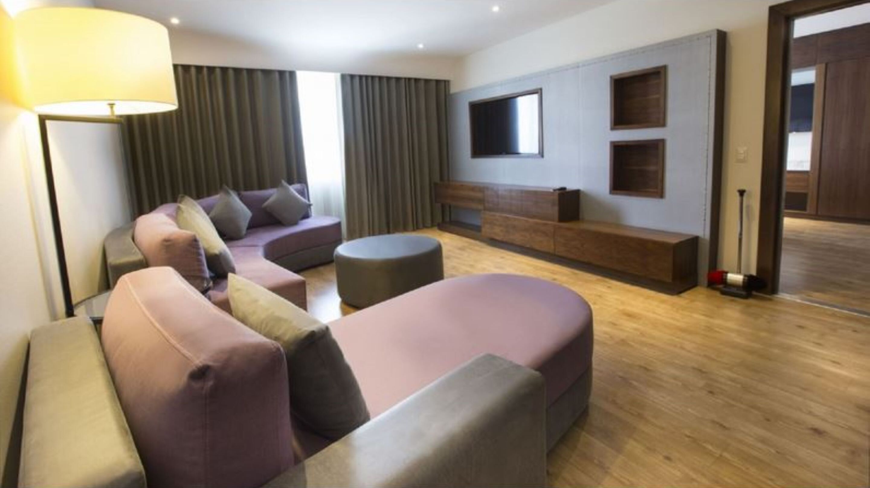 junior suite, 1 king bed, microwave, tower (deluxe junior) | living area | 48-inch led tv with cable channels, tv, ipod dock