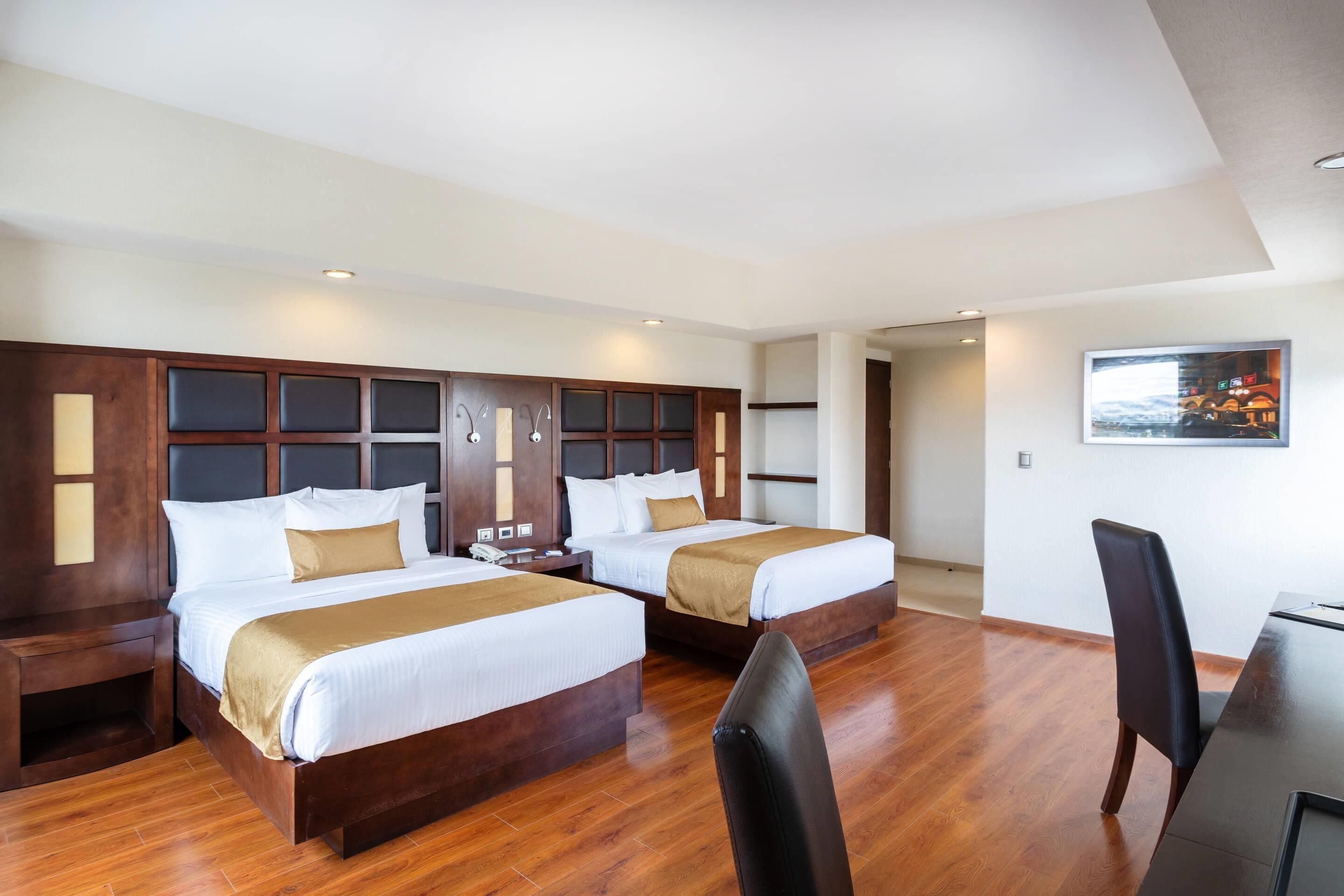 suite, 2 queen beds, non smoking | in-room safe, desk, laptop workspace, free wifi