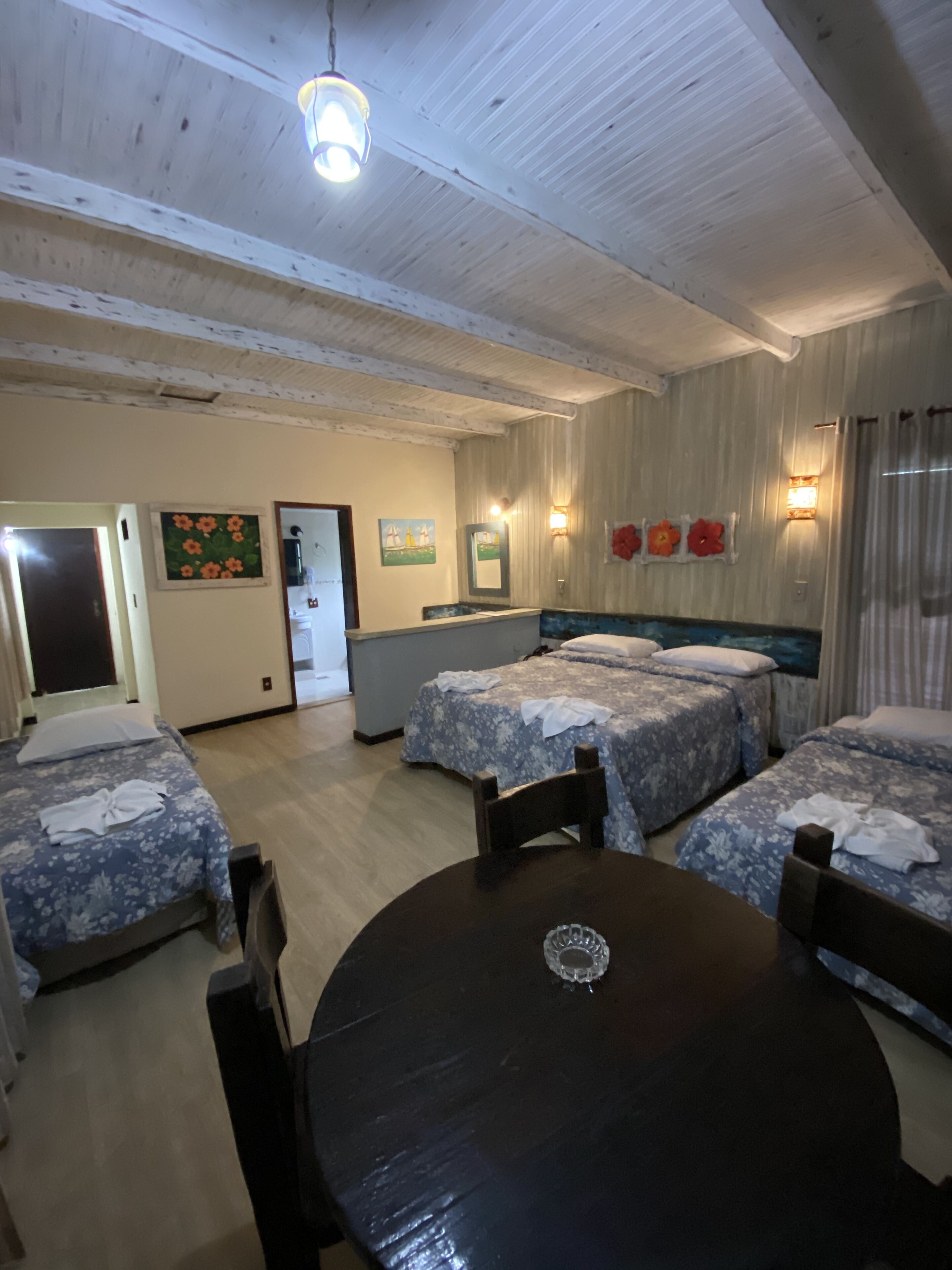 quadruple room | minibar, in-room safe, blackout curtains, iron/ironing board