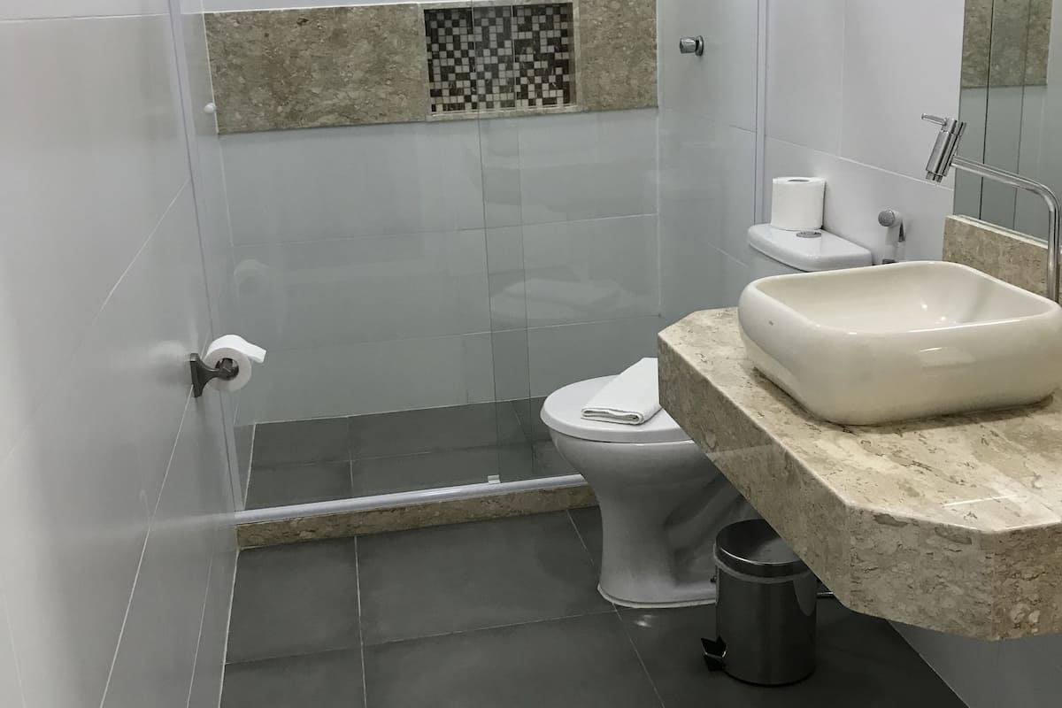 quadruple room | bathroom | shower, hair dryer, towels