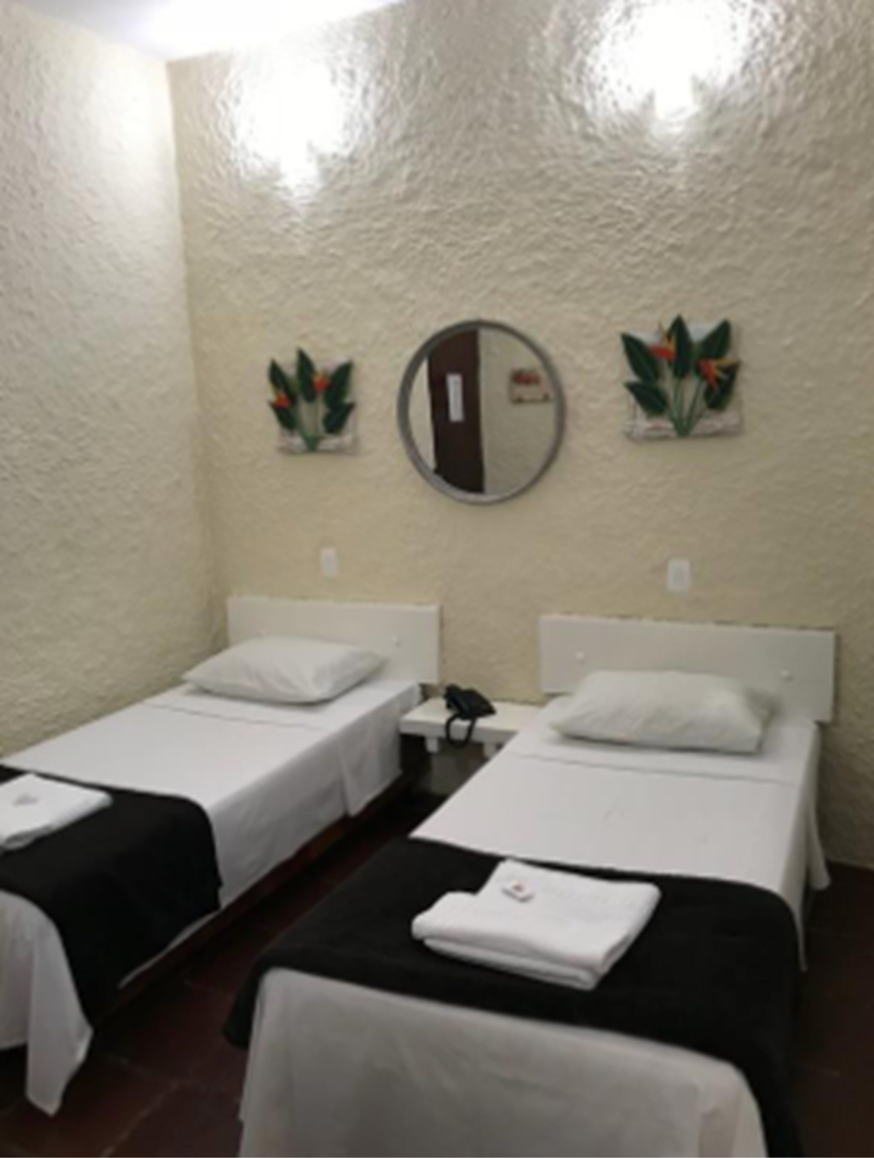 standard twin room, 2 single beds | minibar, in-room safe, blackout curtains, iron/ironing board