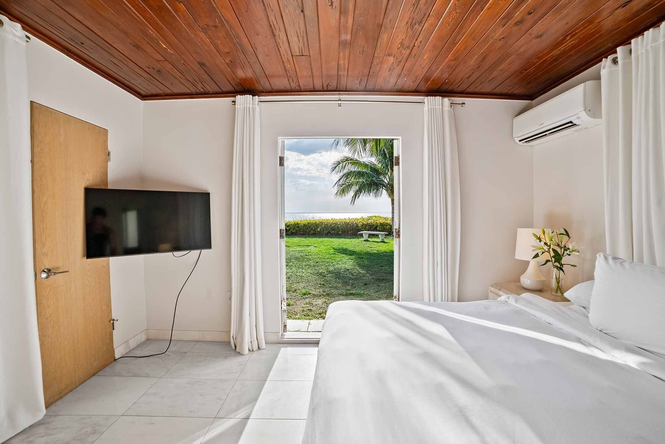 Beach Front Two Bedroom House | Premium bedding, individually furnished, iron/ironing board, free WiFi