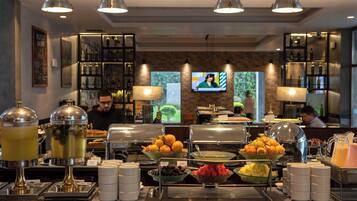 Daily buffet breakfast (USD 16 per person)