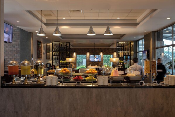 Daily buffet breakfast (USD 16 per person)