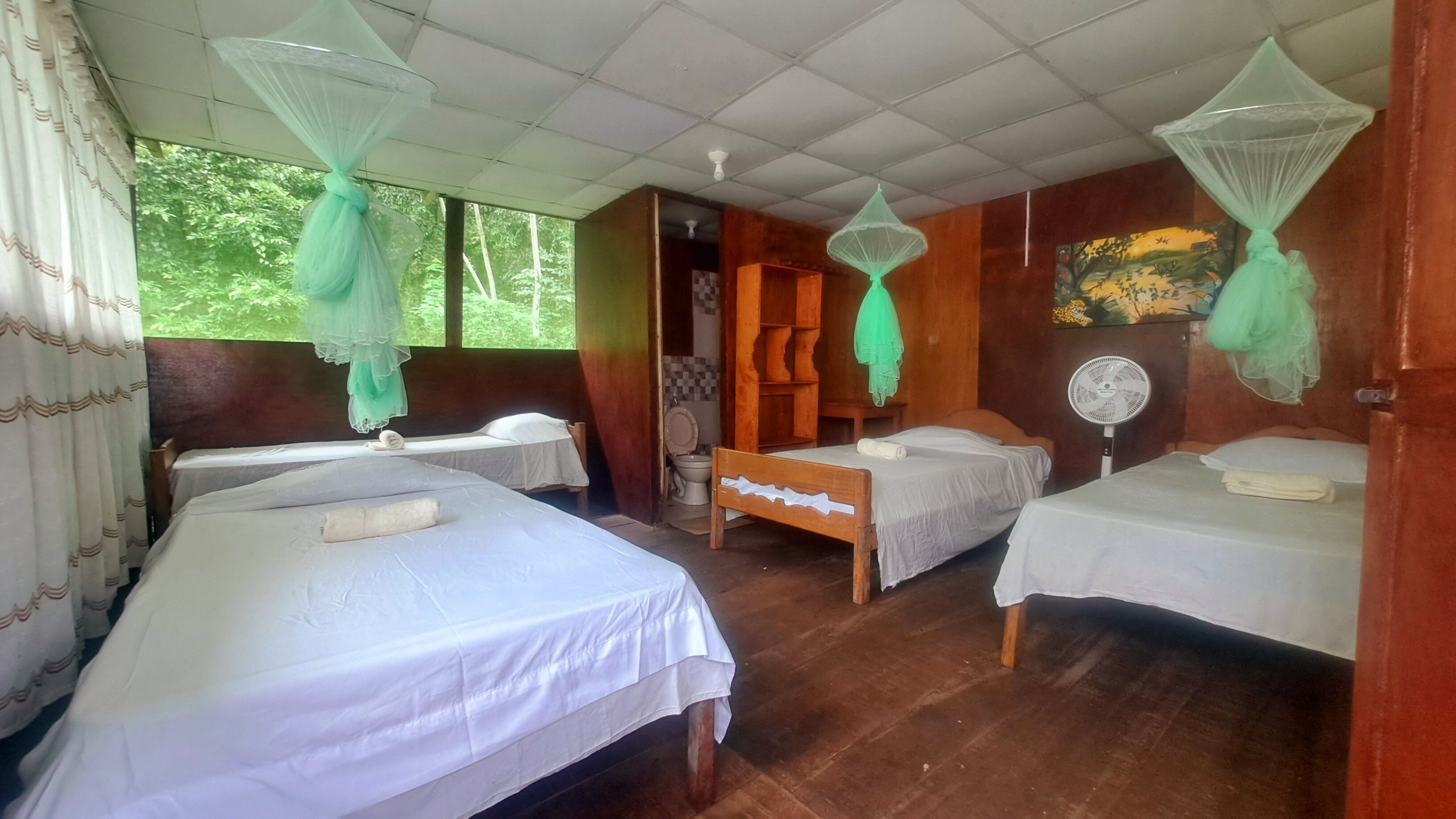 Quadruple Room, Patio, River View | Memory-foam beds, in-room safe, desk, free WiFi