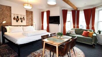 King Studio Apartment with Sleeper Sofa City View | Down comforters, memory foam beds, desk, laptop workspace