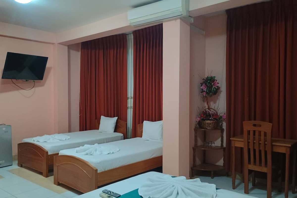 quadruple room, garden view | in-room safe, desk, free wifi, wheelchair access