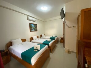 Triple Room, Garden View | In-room safe, desk, free WiFi, wheelchair access