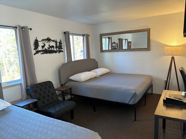 Deluxe Studio | Pillowtop beds, laptop workspace, blackout drapes, free WiFi