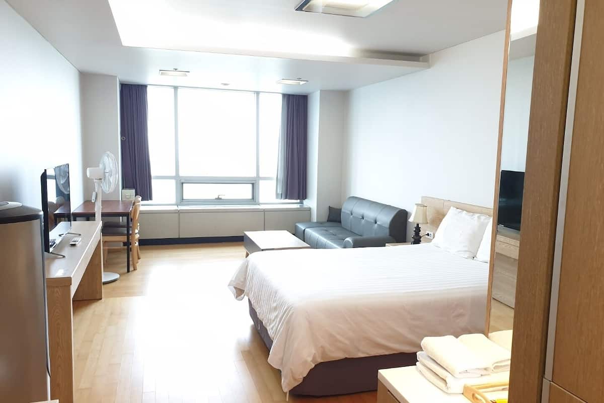 double room | premium bedding, down duvets, individually decorated, blackout curtains