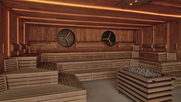 Eine Sauna mit Holzbänken und zwei Wanduhren.