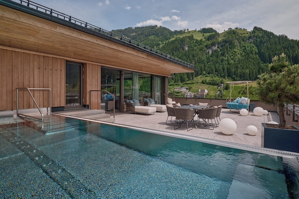 Premium bedding, down duvets, memory-foam beds, free minibar items