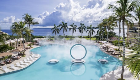 Outdoor pool, open 9:00 AM to 5:00 PM, cabanas (surcharge)