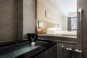 Habitación Premium, 1 cama King size (Hot Spring) | Escritorio, espacio para trabajar con laptop y cortinas blackout 