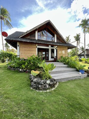 Family Loft Villa | Front of property - evening/night - Sandy Feet Siargao (General Luna)